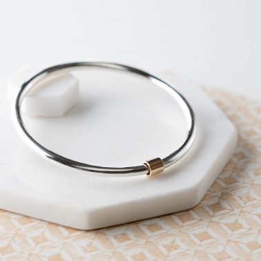 Sterling silver bangle, 9ct gold detail free to move round bangle